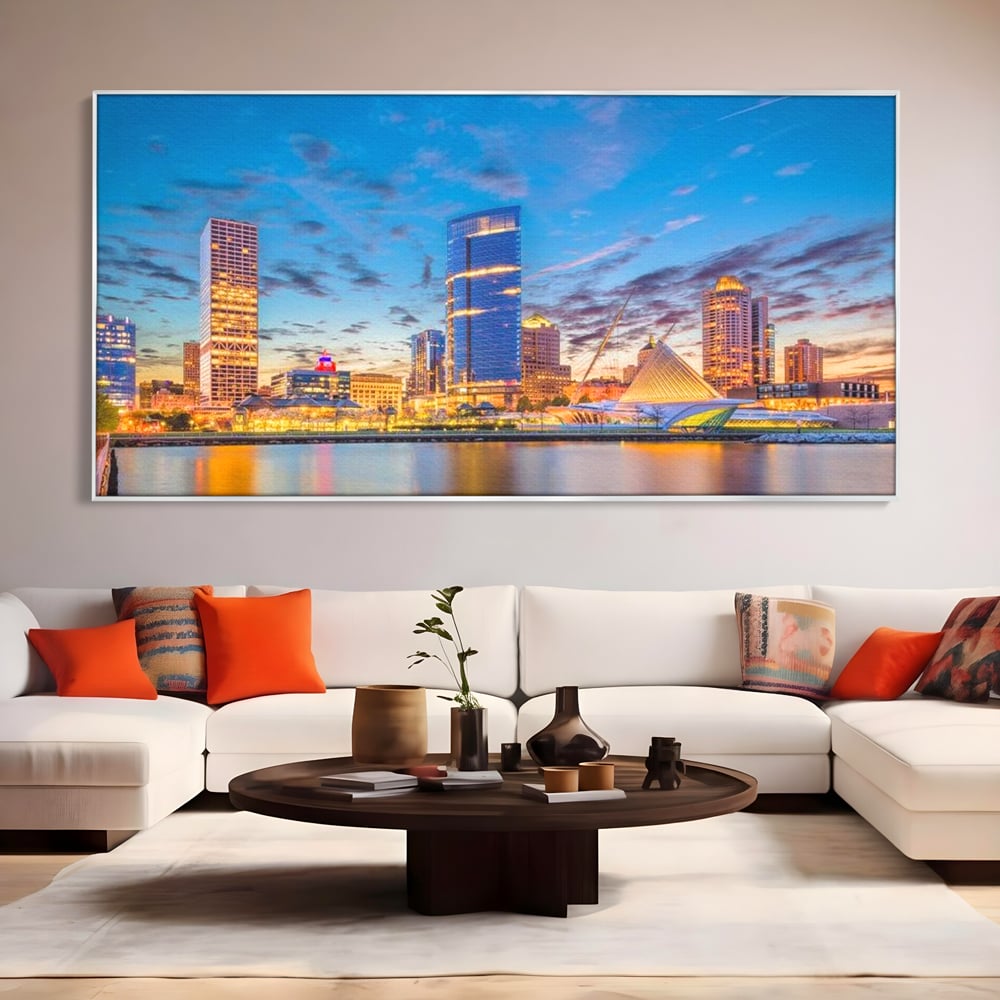 Tablou canvas cu panorami urbana nocturna milwaukee pe apa, in rama de aluminiu argintiu, pe perete intr-un living